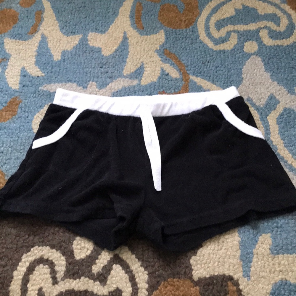 Black and white shorts.